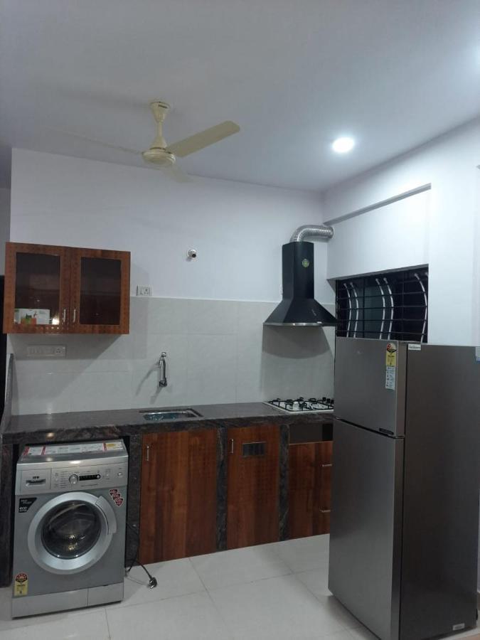 Esha Apartment กาลังกูติ ห้อง รูปภาพ