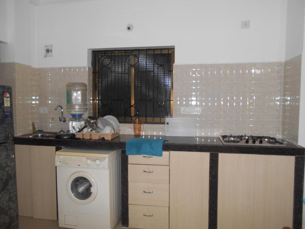 Esha Apartment กาลังกูติ ห้อง รูปภาพ