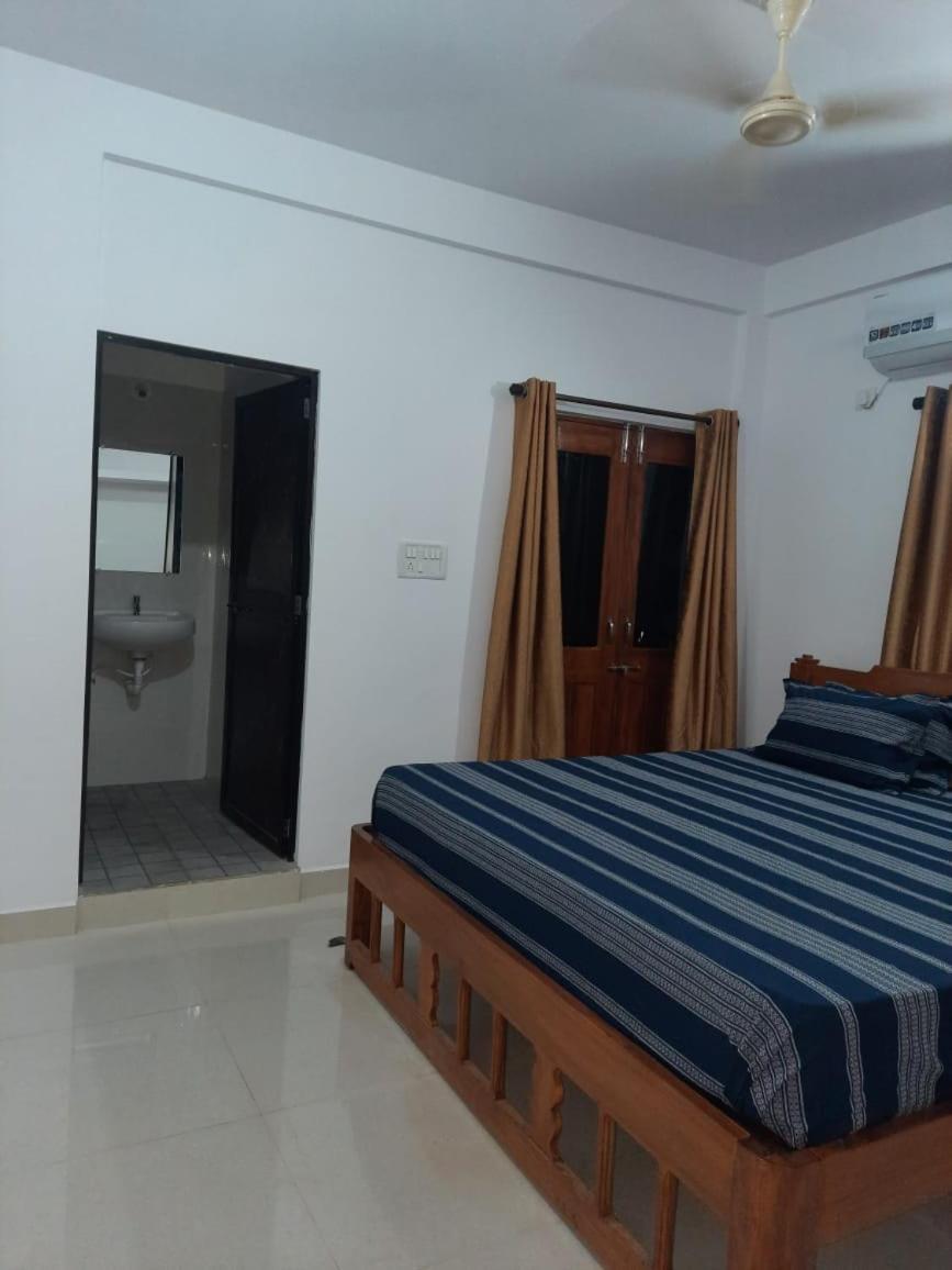 Esha Apartment กาลังกูติ ห้อง รูปภาพ