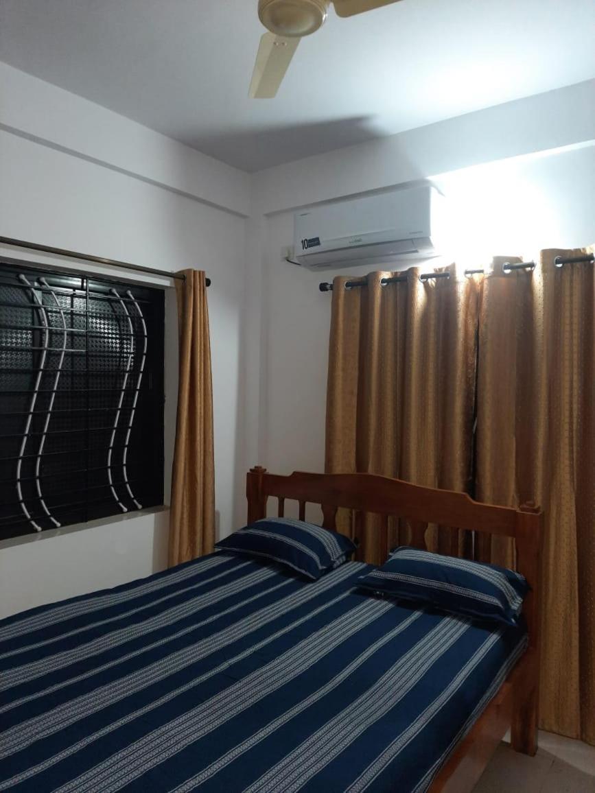 Esha Apartment กาลังกูติ ห้อง รูปภาพ