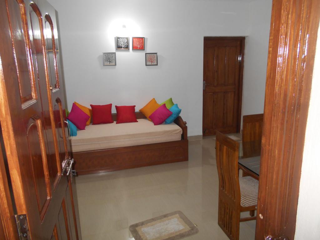 Esha Apartment กาลังกูติ ห้อง รูปภาพ